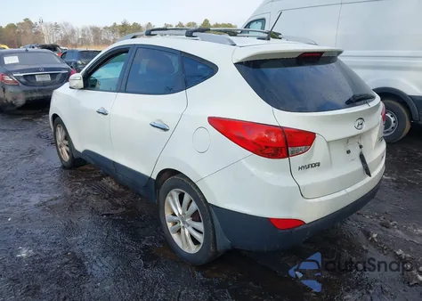 2012 Hyundai Tucson Limited из США, поврежденный, VIN KM8JUCAC5CU382313